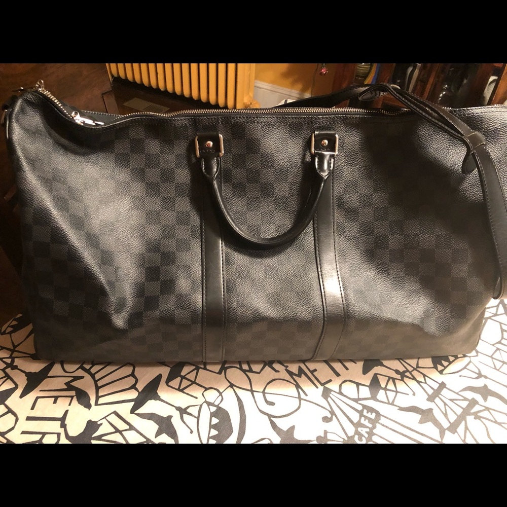 Louis Vuitton KEEPALL rarely used, looks new